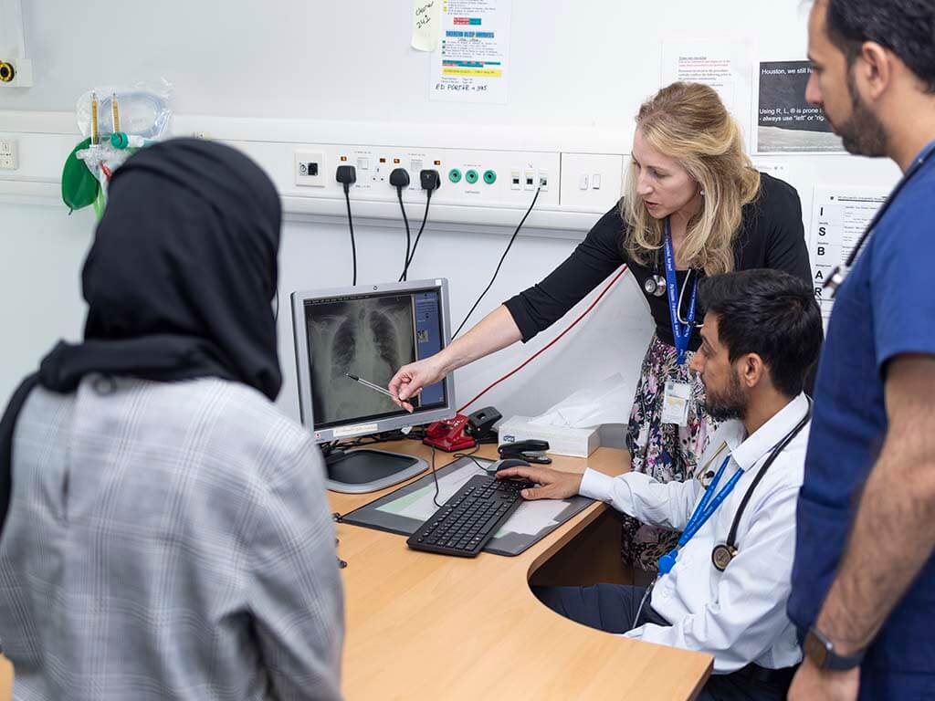 Doctors reviewing xray